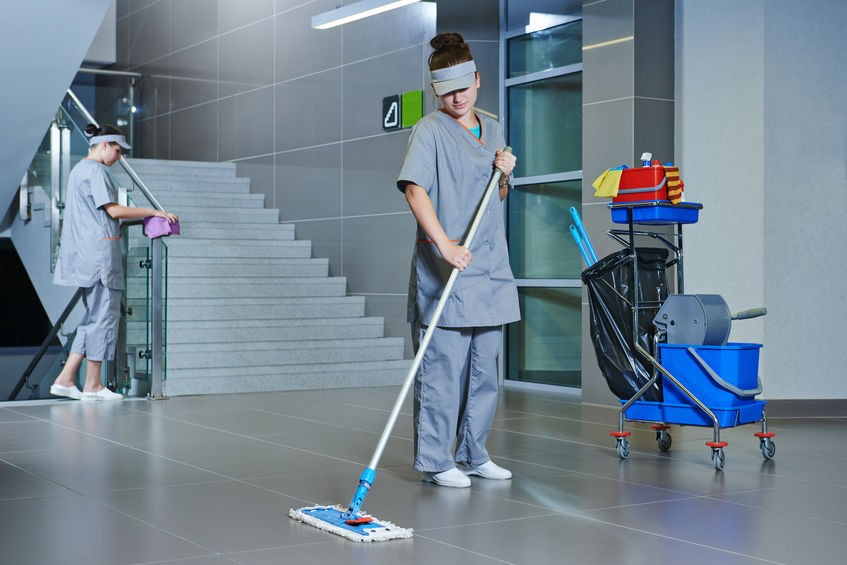 Floor care and cleaning services with washing machine in supermarket shop store